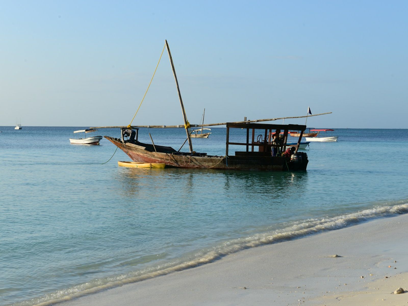 Example: a wooden dhow off a Zanzibar beach